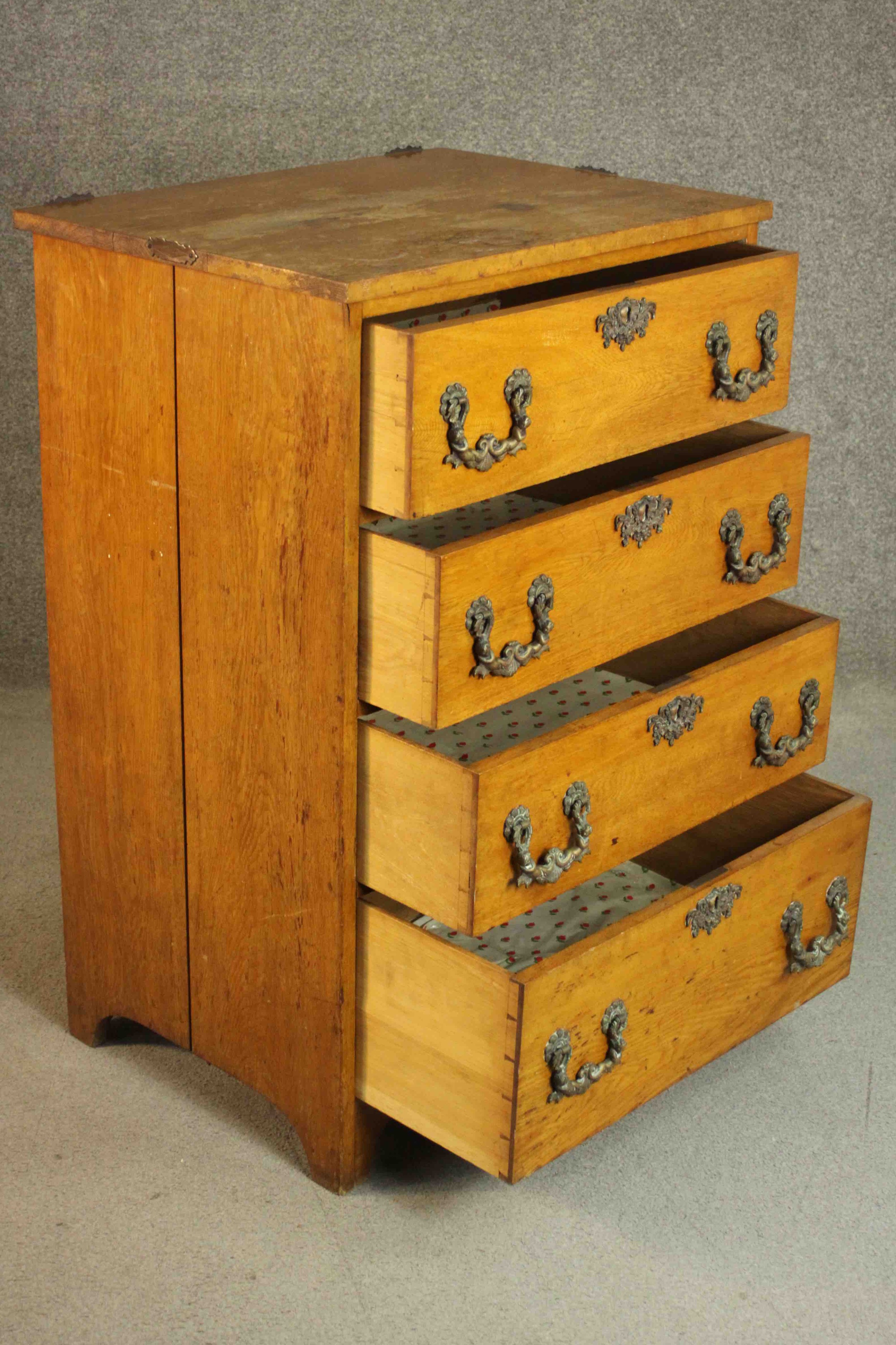 A late 19th/early 20th century oak chest of four long drawers with ornately cast bronze swing - Image 5 of 8