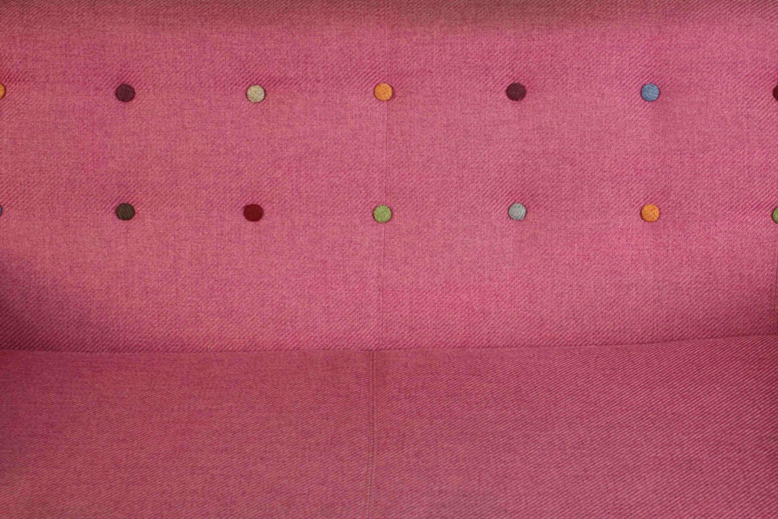 A contemporary Made.com Ritchie sofa, upholstered in pink with a polychrome buttoned back on - Image 3 of 8