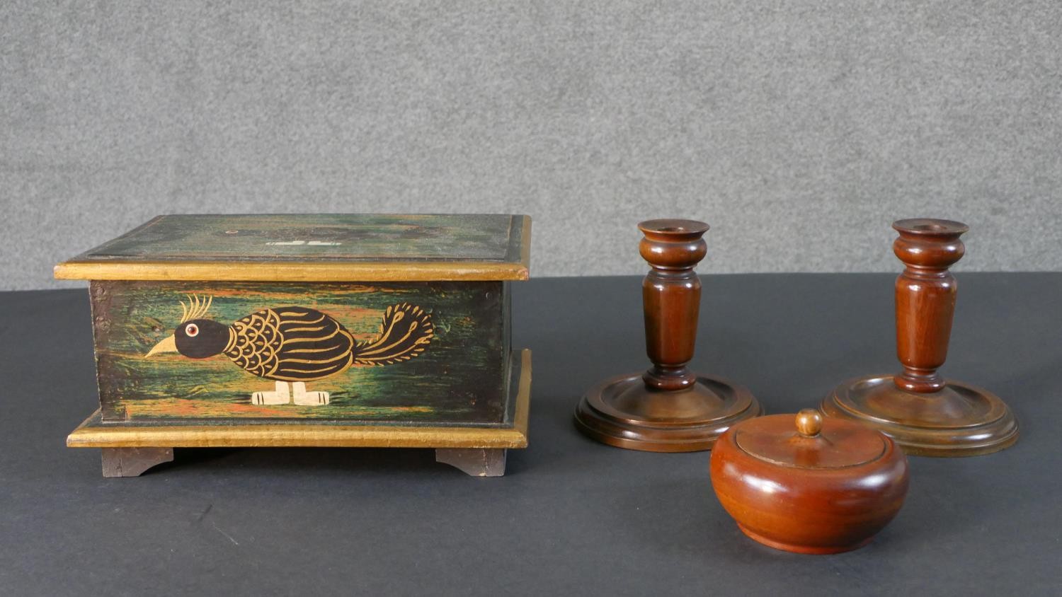 An Indian painted bird jewellery box with fold out mirror and draw along with a pair of turned