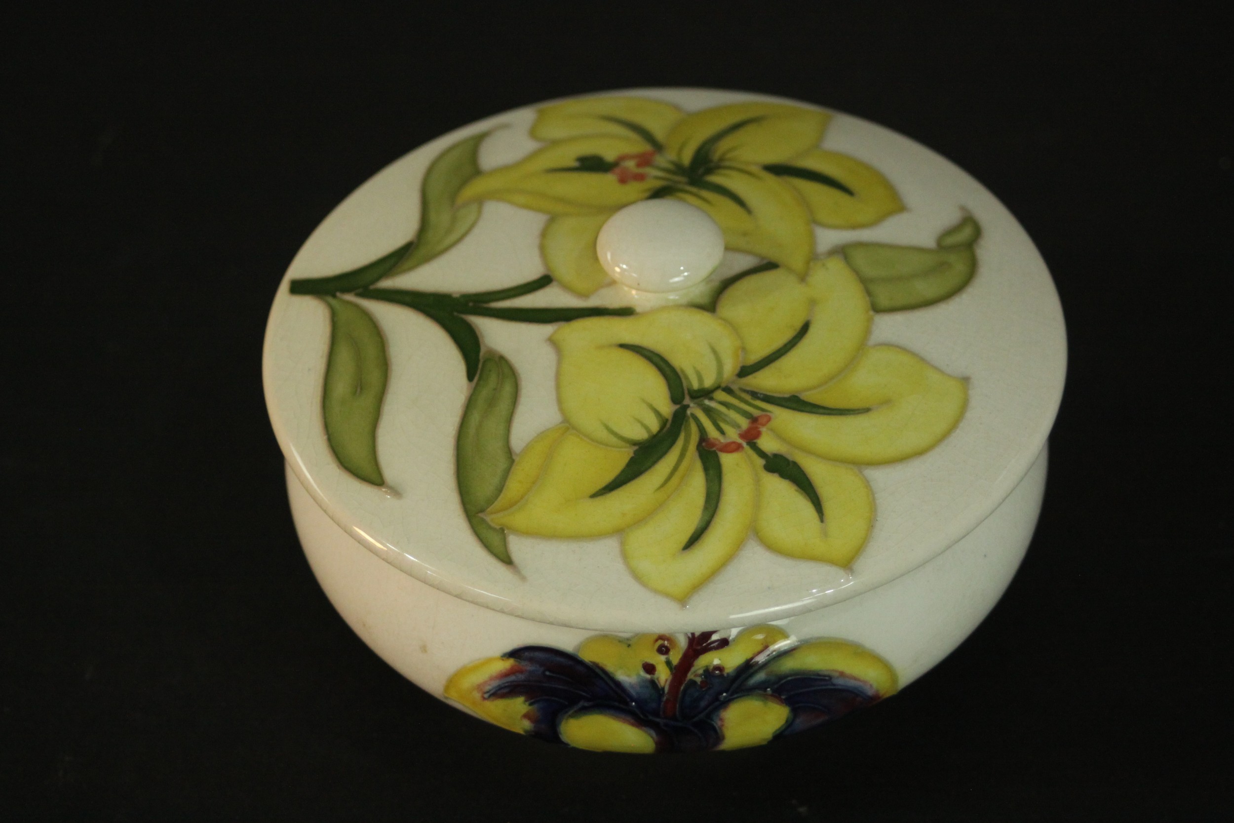 A Moorcroft yellow lily jar and cover, with tube lined decoration and bearing Queen Mary paper - Image 2 of 5