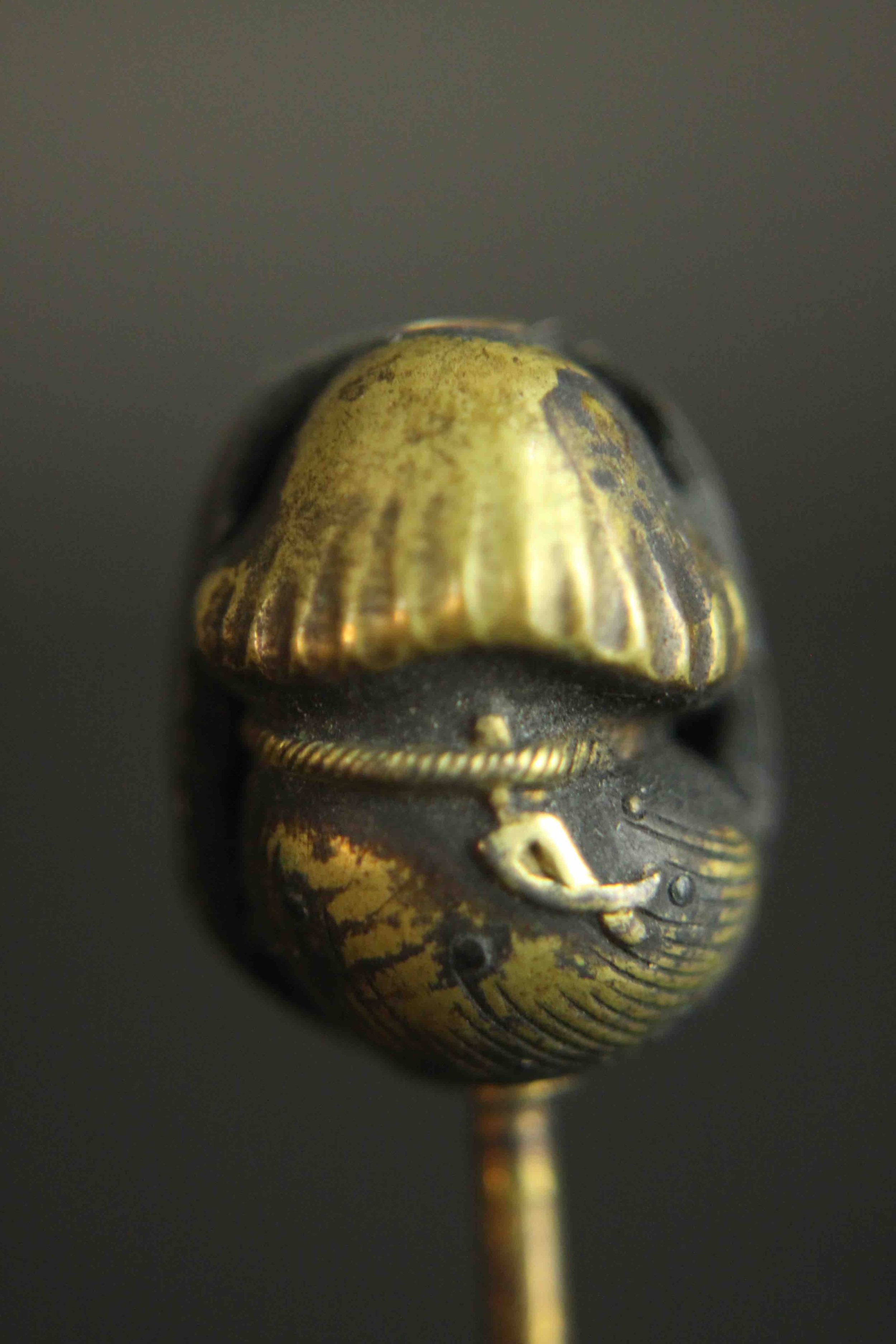 A Japanese Meji period Shakudo ware stick pin one side with a man's face and the other side with a - Image 8 of 9