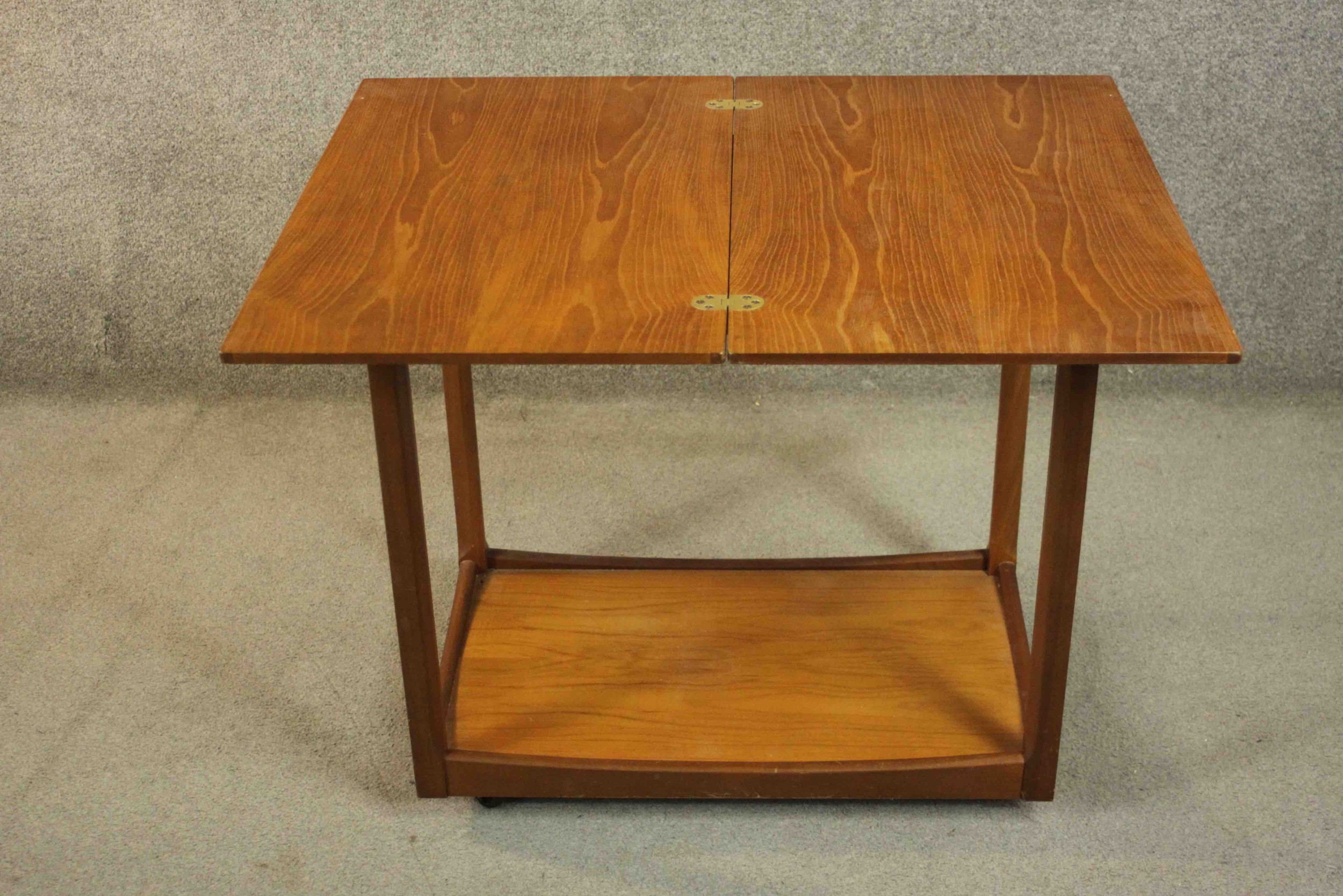 A circa 1960s teak trolley by Legate of Scotland of rectangular form with an undertier. H.68 W.71 - Image 8 of 16