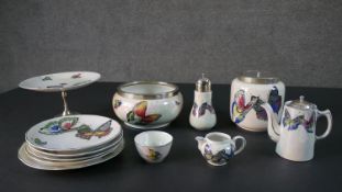 A four person Burslem pottery butterfly lustre design pattern part tea set. Includes, four cake