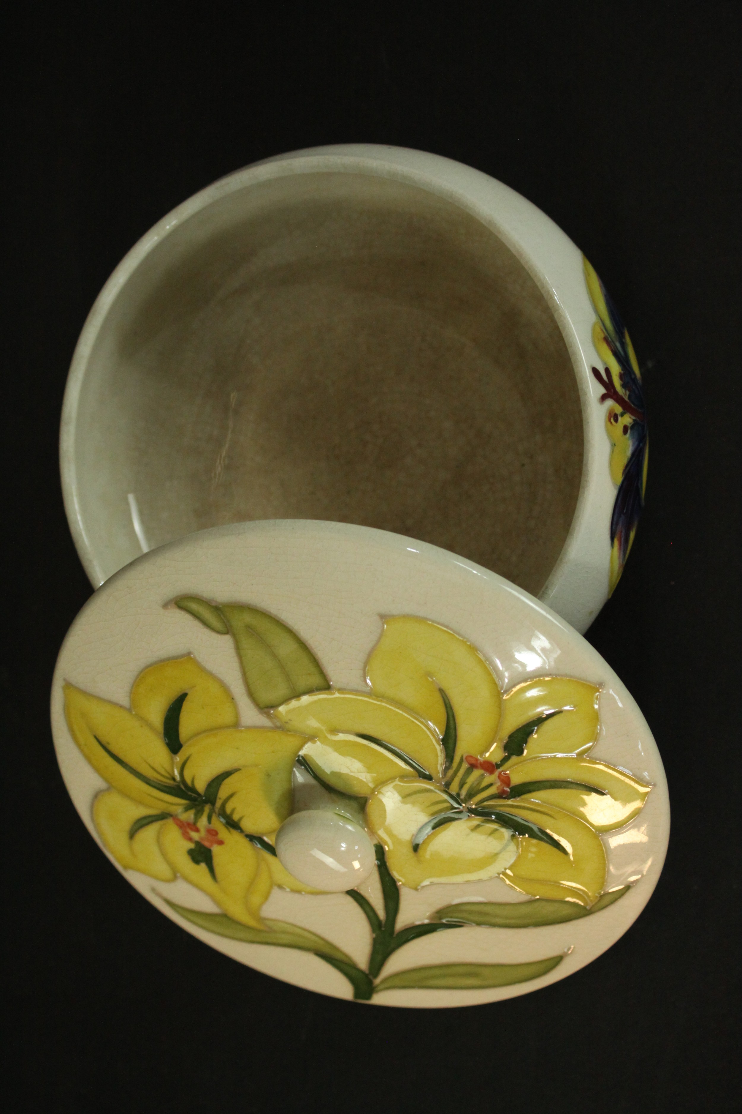 A Moorcroft yellow lily jar and cover, with tube lined decoration and bearing Queen Mary paper - Image 3 of 5