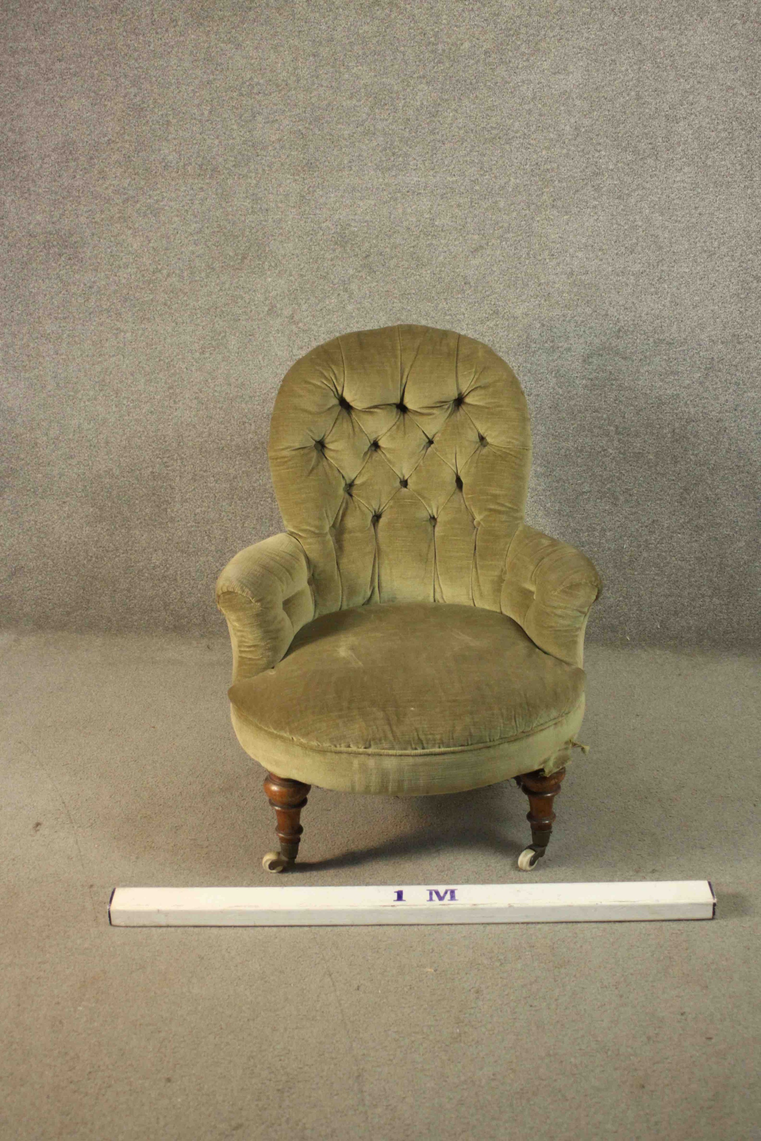 A Victorian armchair, upholstered in green velour with a buttoned back and arms, on turned walnut - Image 2 of 7