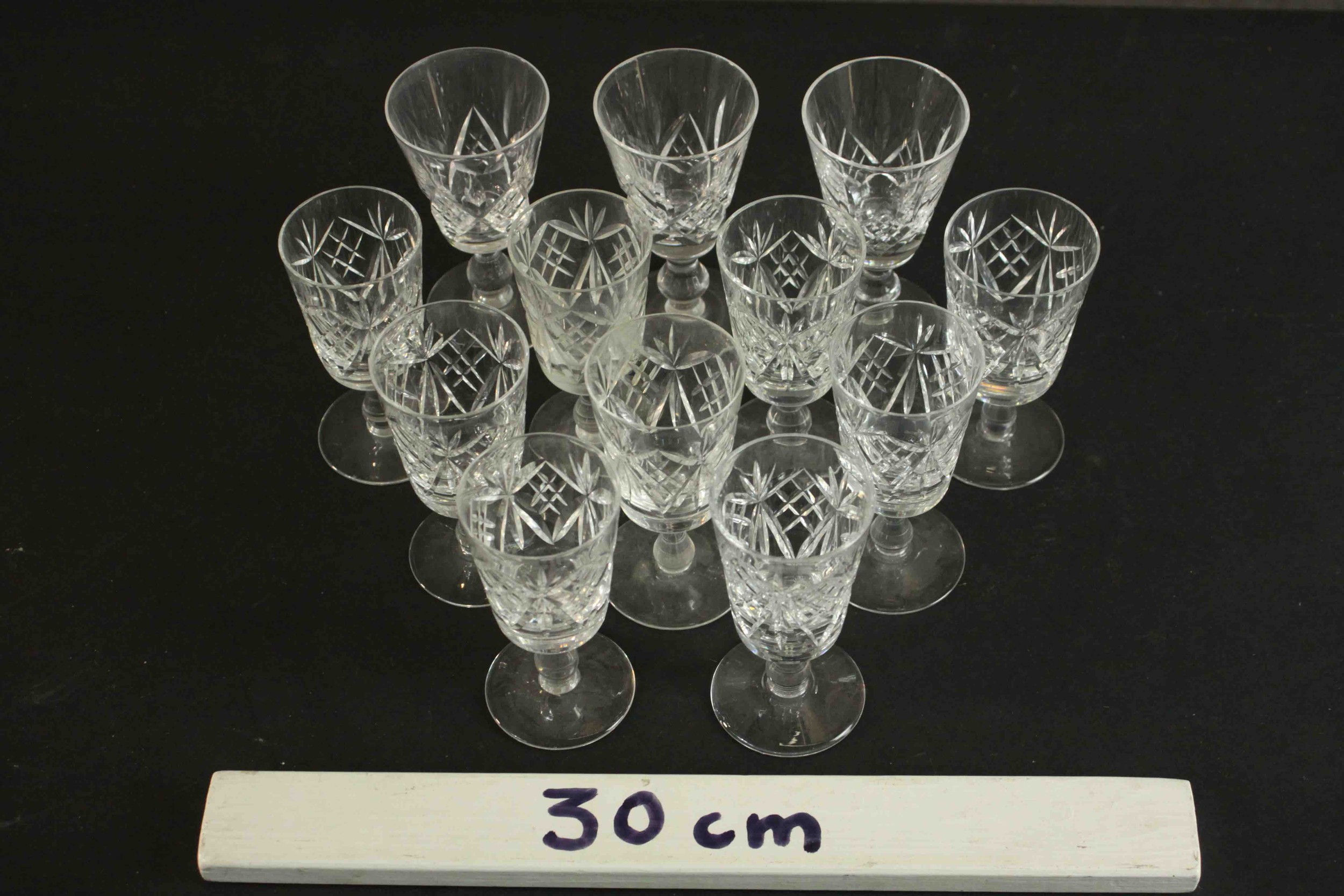 A set of twelve hand cut crystal sherry glasses. H.10cm. (largest) - Image 2 of 4