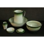 A Victorian or Edwardian Staffordshire pottery wash set, with green glazed detail. H.12 Dia.37cm. (