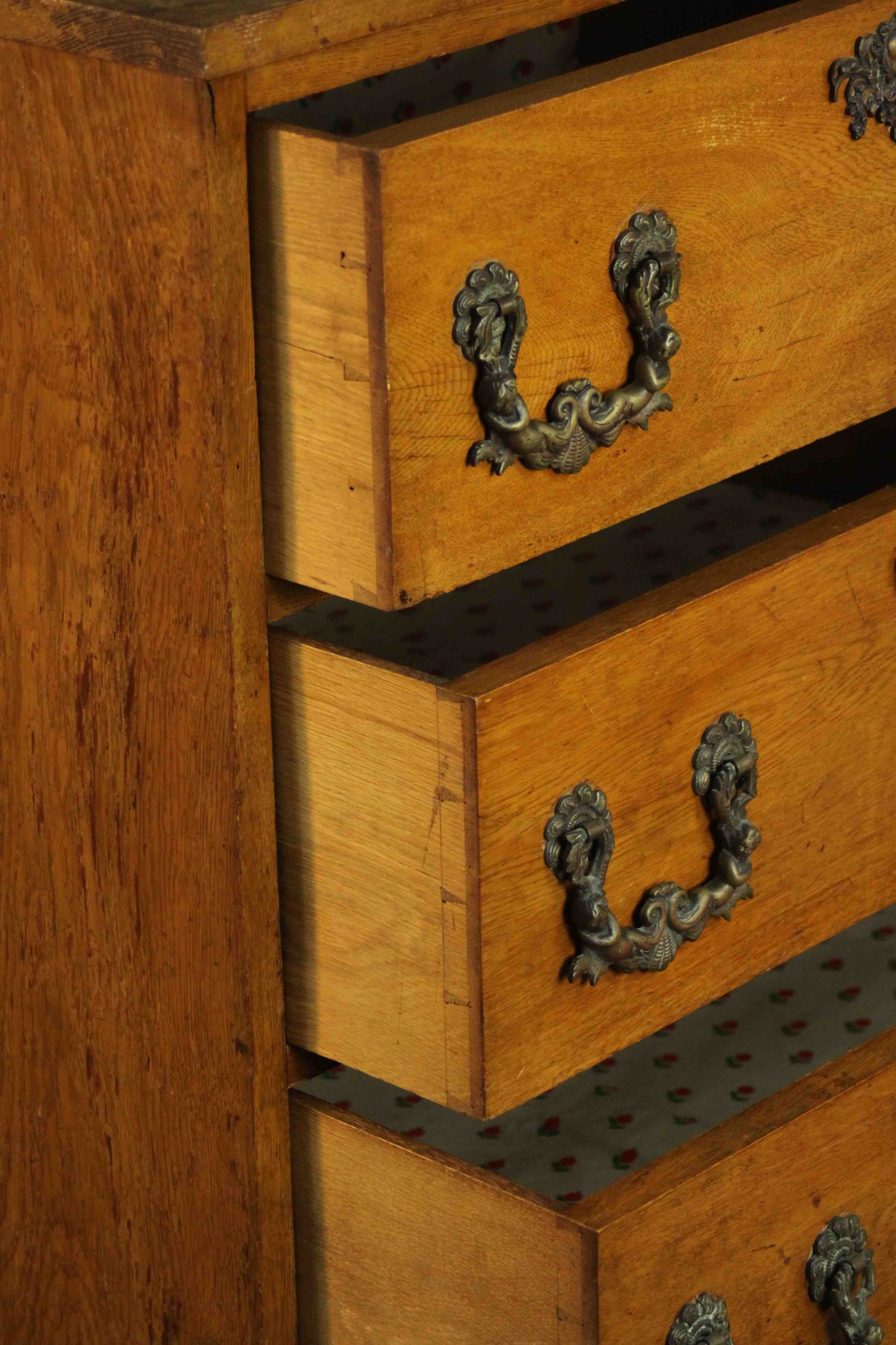 A late 19th/early 20th century oak chest of four long drawers with ornately cast bronze swing - Image 7 of 8