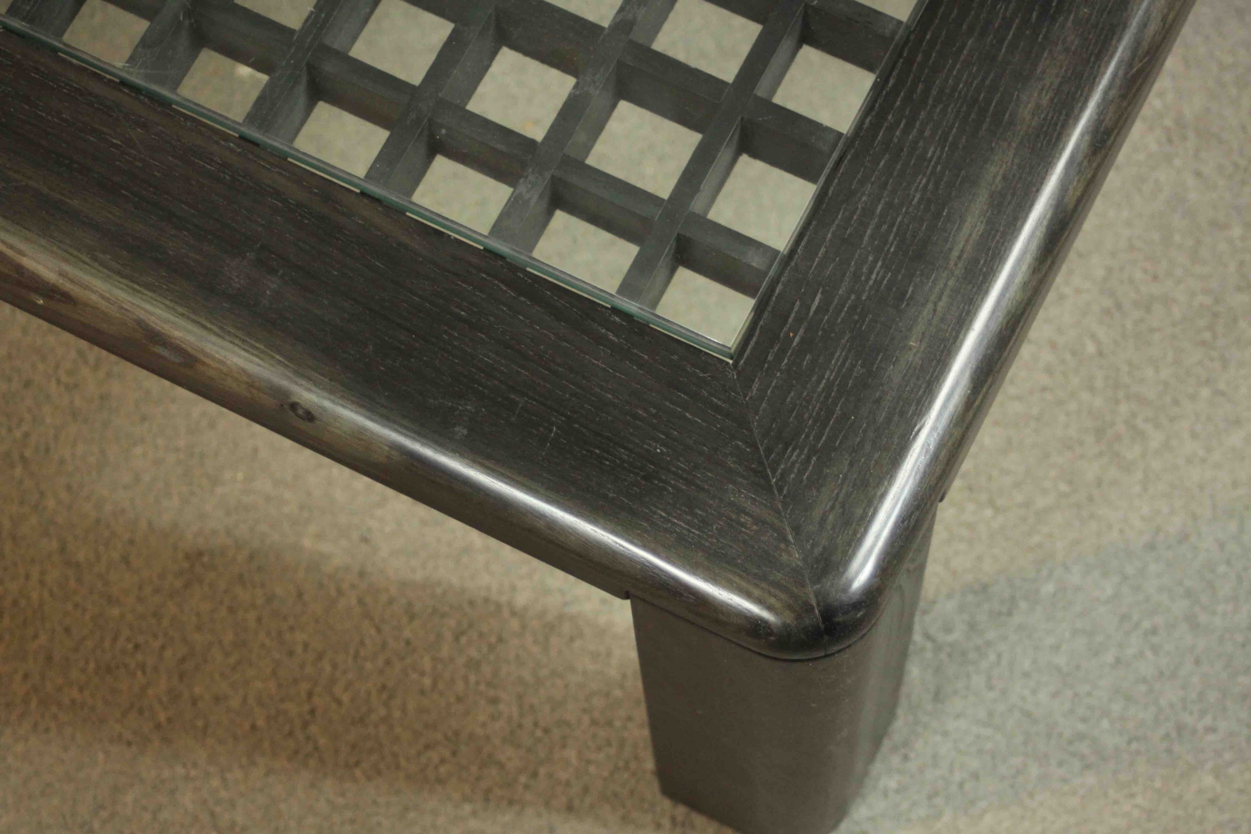 A contemporary ebonised ash coffee table, of square form with a lattice centre. H.35 W.90 D.90cm. - Image 5 of 6