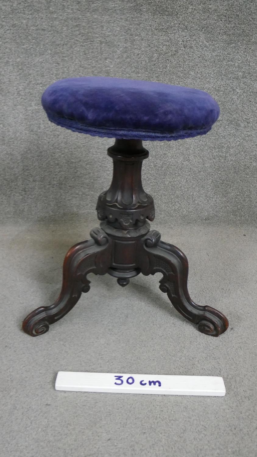 A Victorian mahogany stool, the circular seat upholstered in blue velour on a carved baluster stem - Image 2 of 4