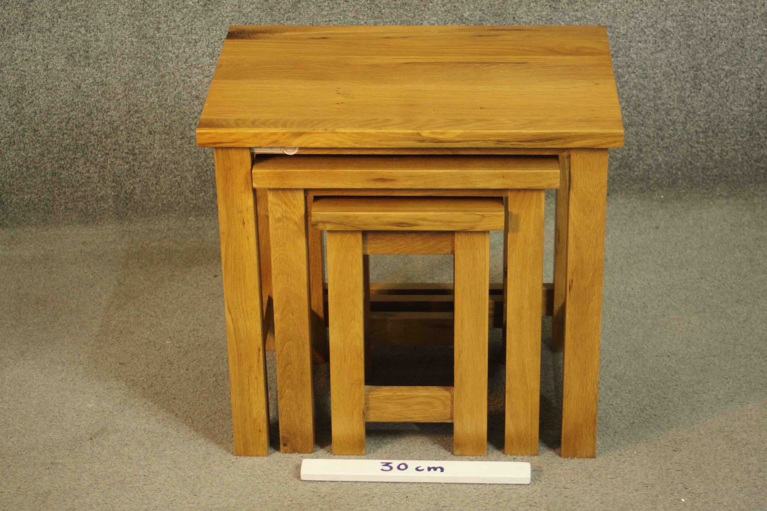 A contemporary oak nest of three occasional low tables of rectangular form on square section legs - Image 2 of 6