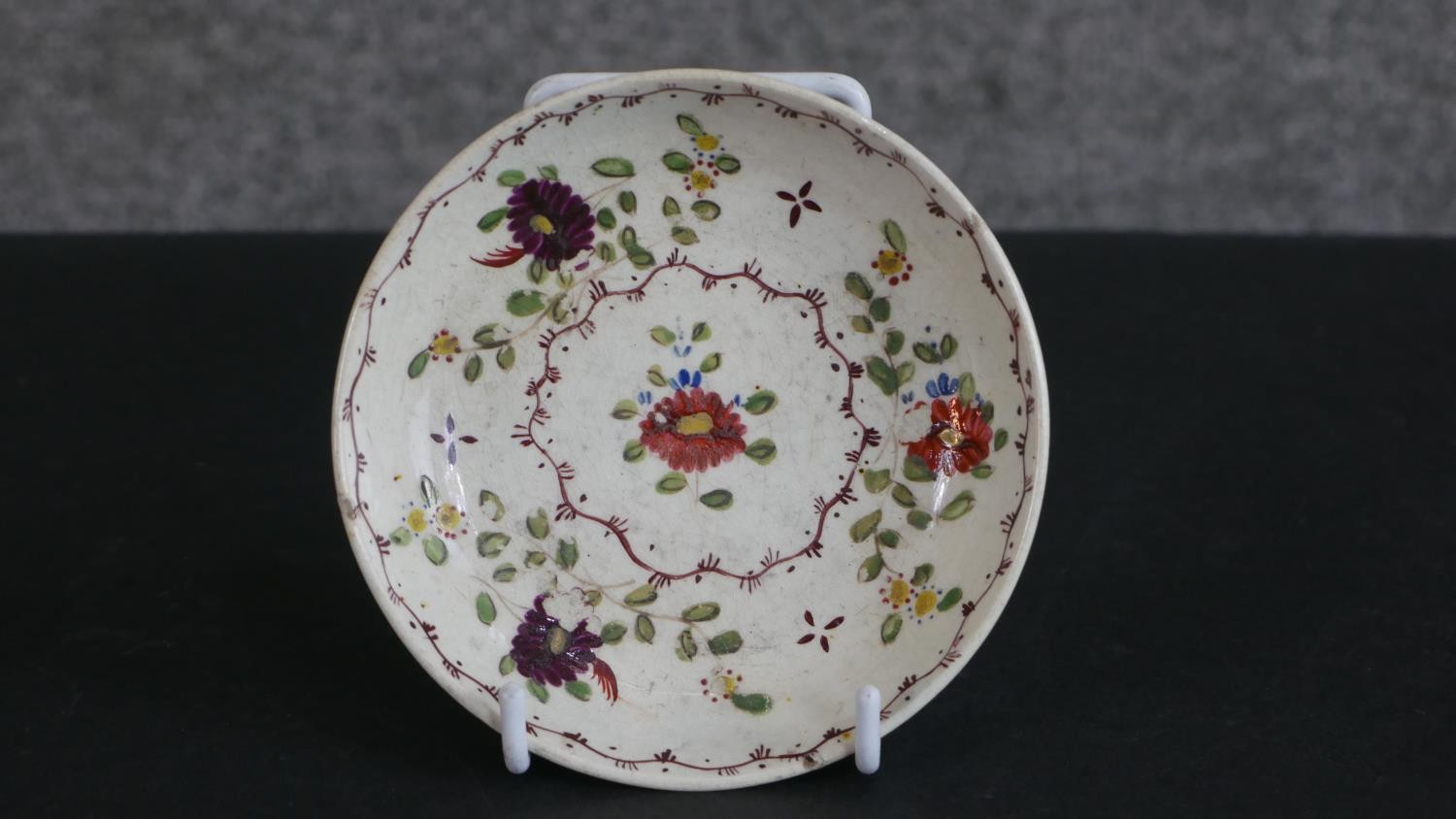 A 19th century floral design hand-painted ceramic dolls tea set for four people (one cup missing), - Image 6 of 8