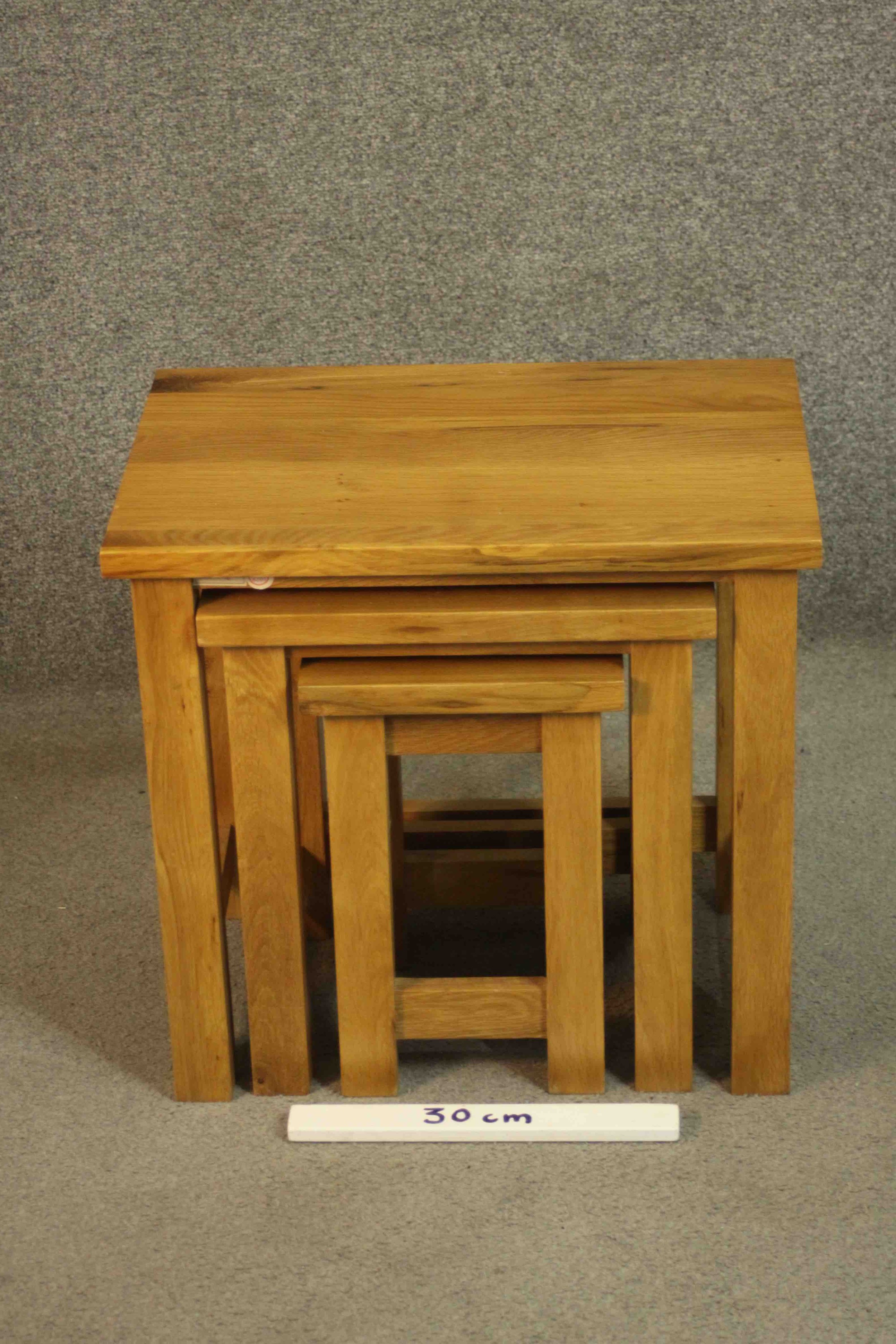 A contemporary oak nest of three occasional low tables of rectangular form on square section legs - Image 3 of 6