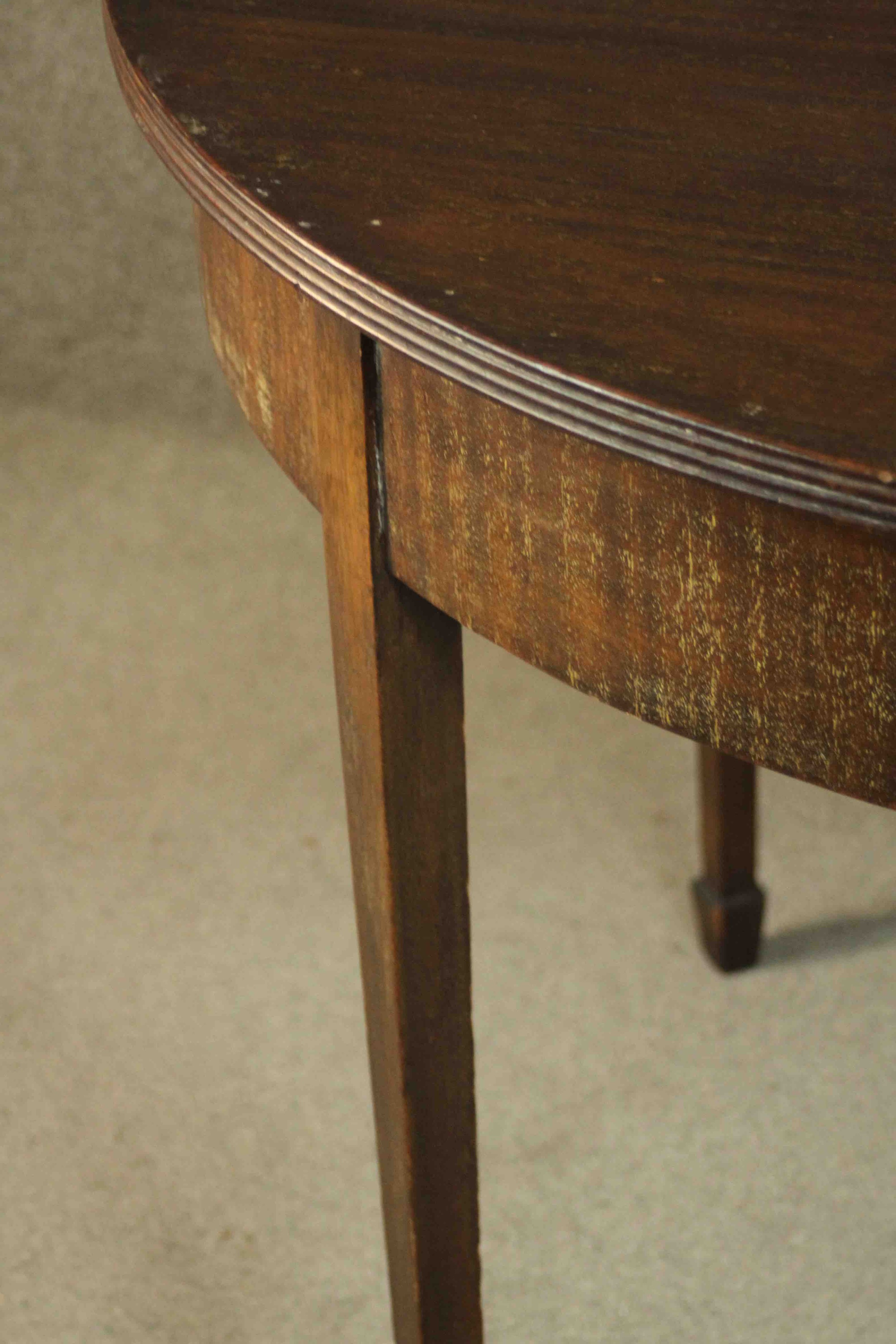 A George III mahogany demi-lune tea table, with a moulded edge and foldover top on square section - Image 8 of 10