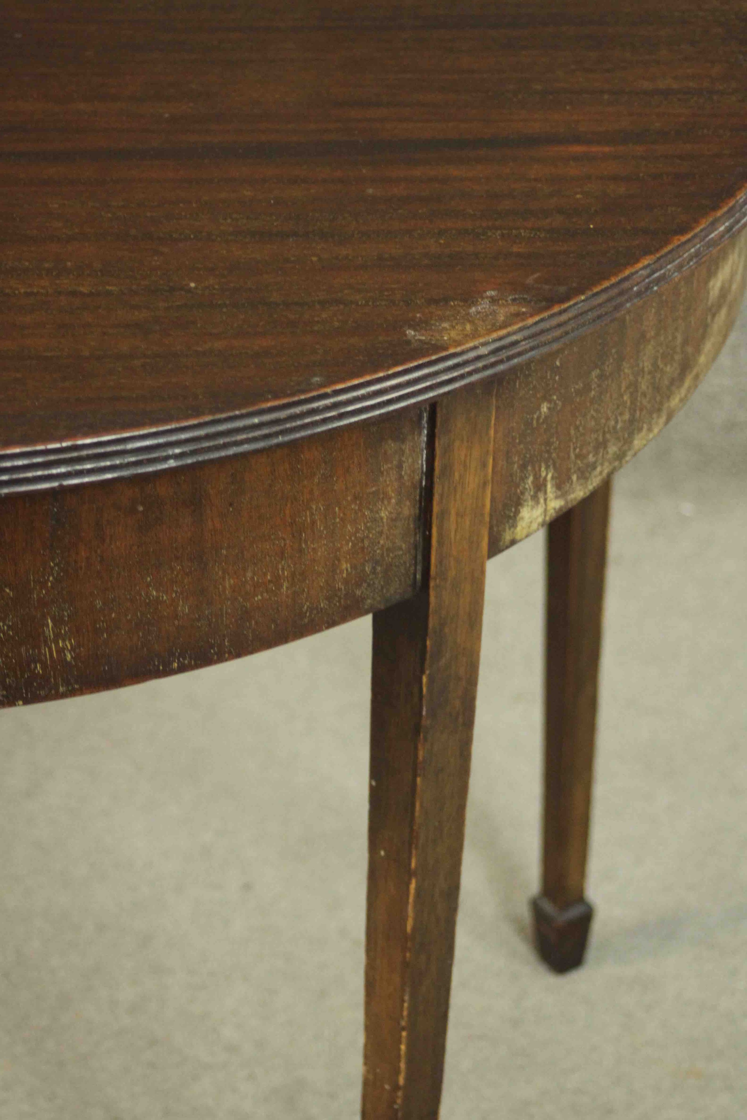 A George III mahogany demi-lune tea table, with a moulded edge and foldover top on square section - Image 7 of 10