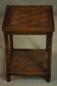 A late 20th century parquetry inlaid side table, with a gallery top, on turned legs joined by a