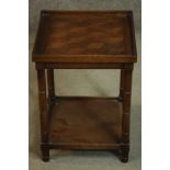 A late 20th century parquetry inlaid side table, with a gallery top, on turned legs joined by a