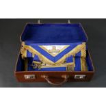 A collection of Masonic regalia in a brown leather case. H.27 W.50 D.12cm (suitcase)