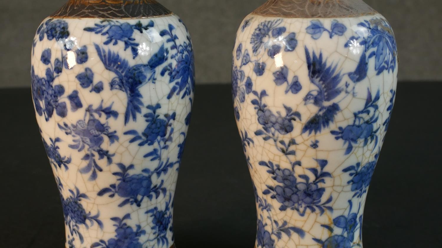 A pair of early 20th century Chinese blue and white crackle glazed vases and covers. The lidded jars - Image 4 of 8