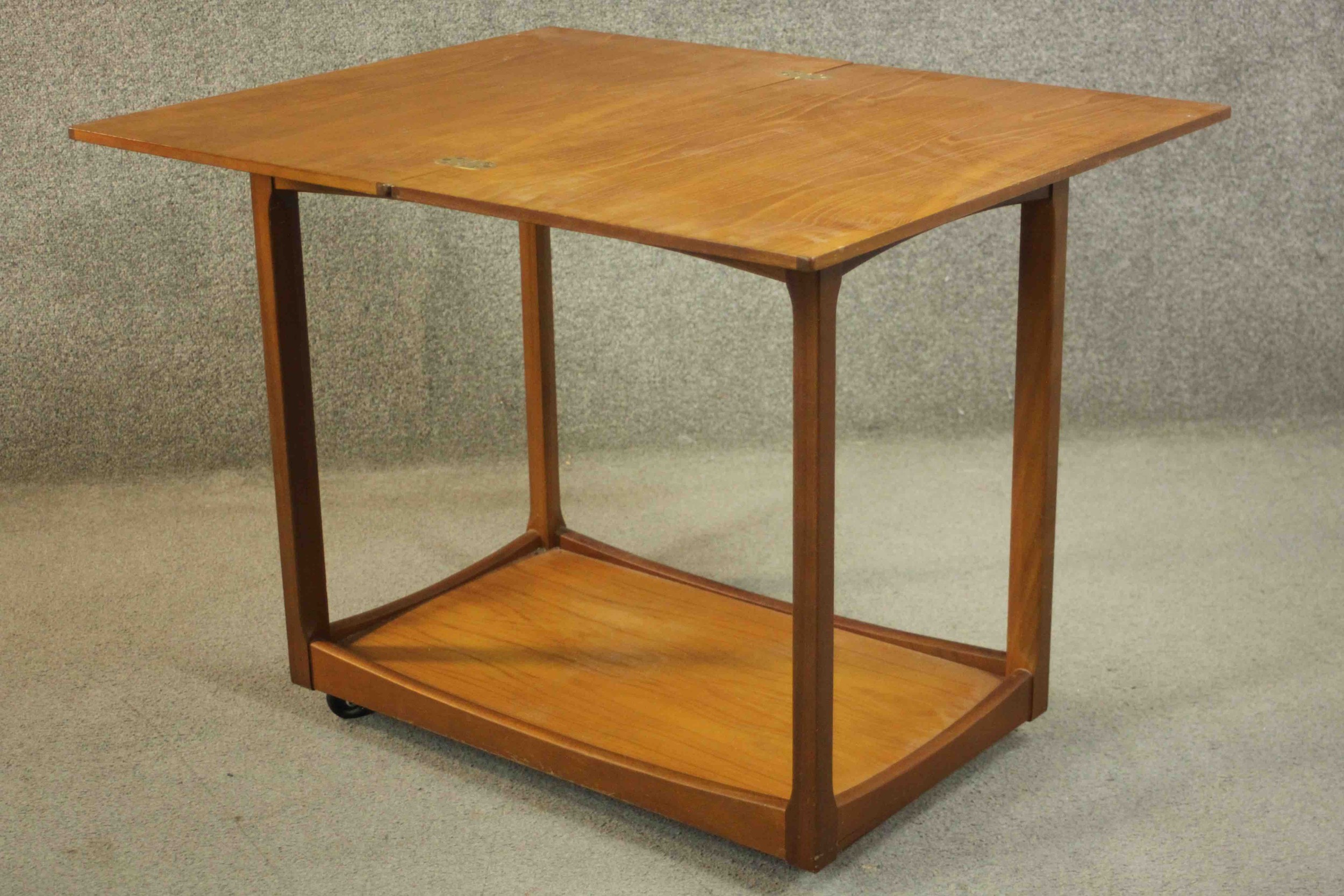 A circa 1960s teak trolley by Legate of Scotland of rectangular form with an undertier. H.68 W.71 - Image 13 of 16