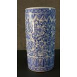 A vintage blue and white Chinese ceramic stylised floral design umbrella stand. Printed character