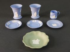 A collection of Wedgwood Jasperware, including two blue and white classical design vases, a coffee
