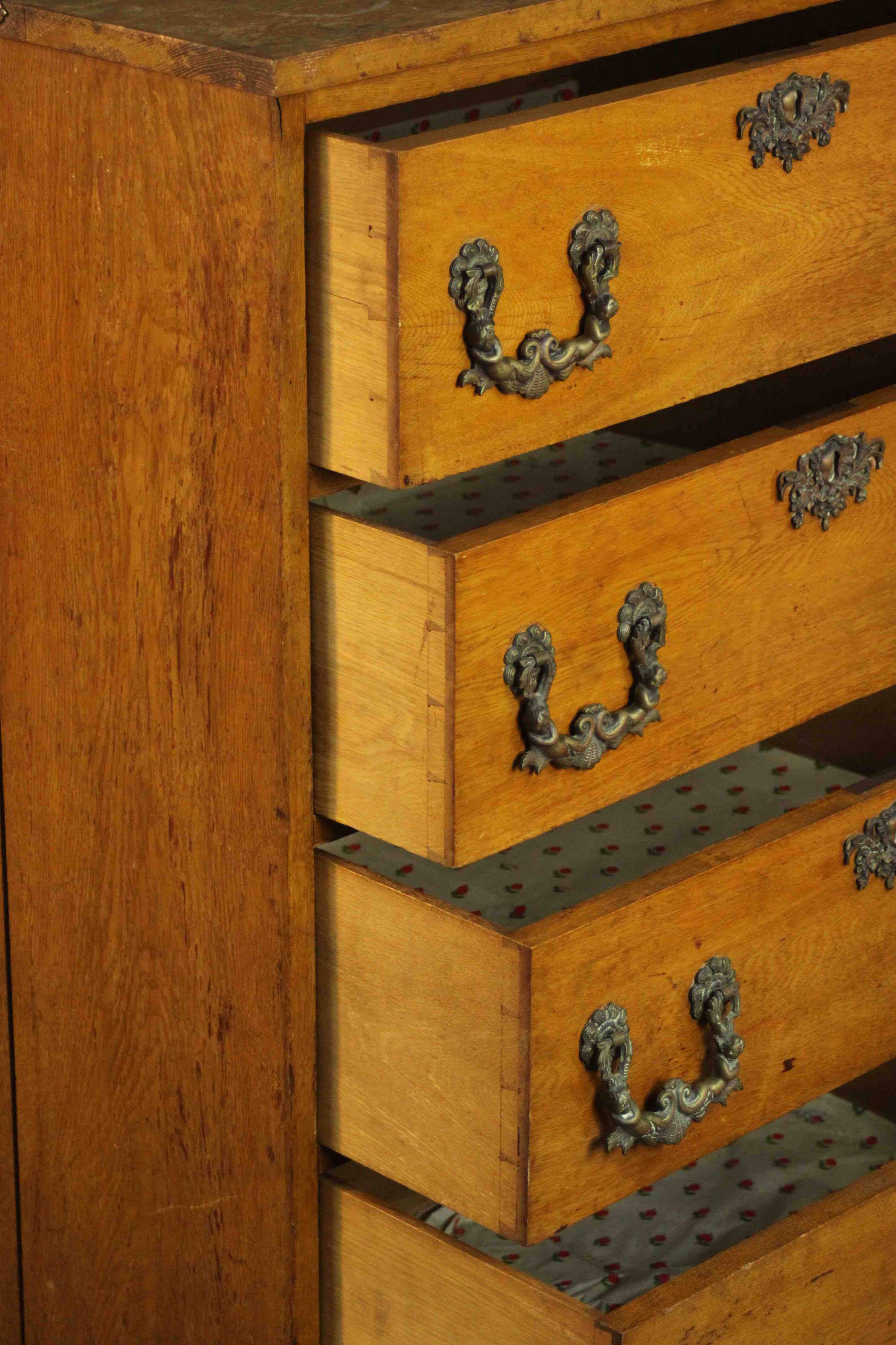 A late 19th/early 20th century oak chest of four long drawers with ornately cast bronze swing - Image 6 of 8