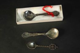 Three Norwegian silver spoons. One in box with sailing ship design. Stamped 800 with makers marks.