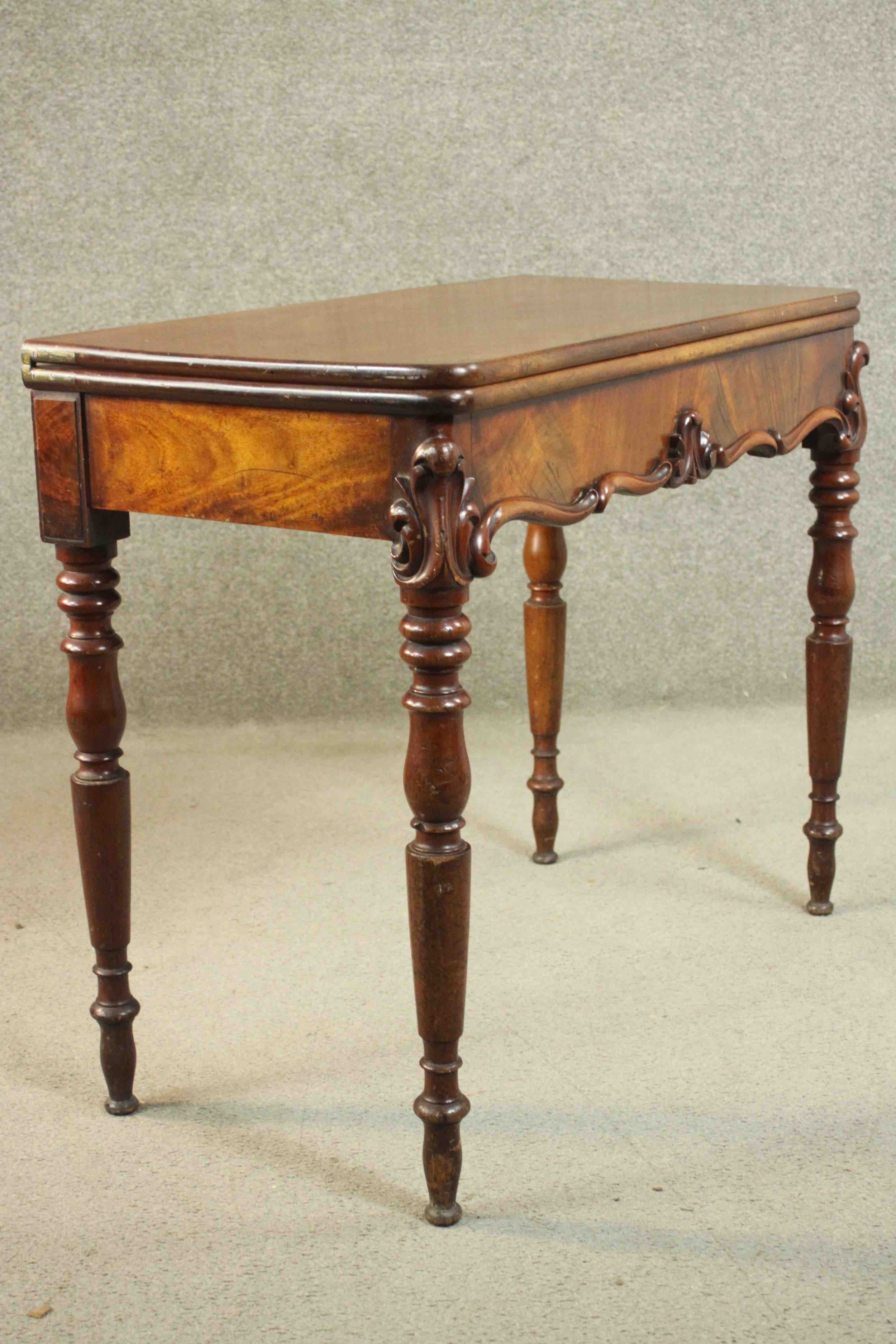 A Victorian mahogany tea table, of rectangular form with a foldover top over a shaped frieze with - Image 3 of 12