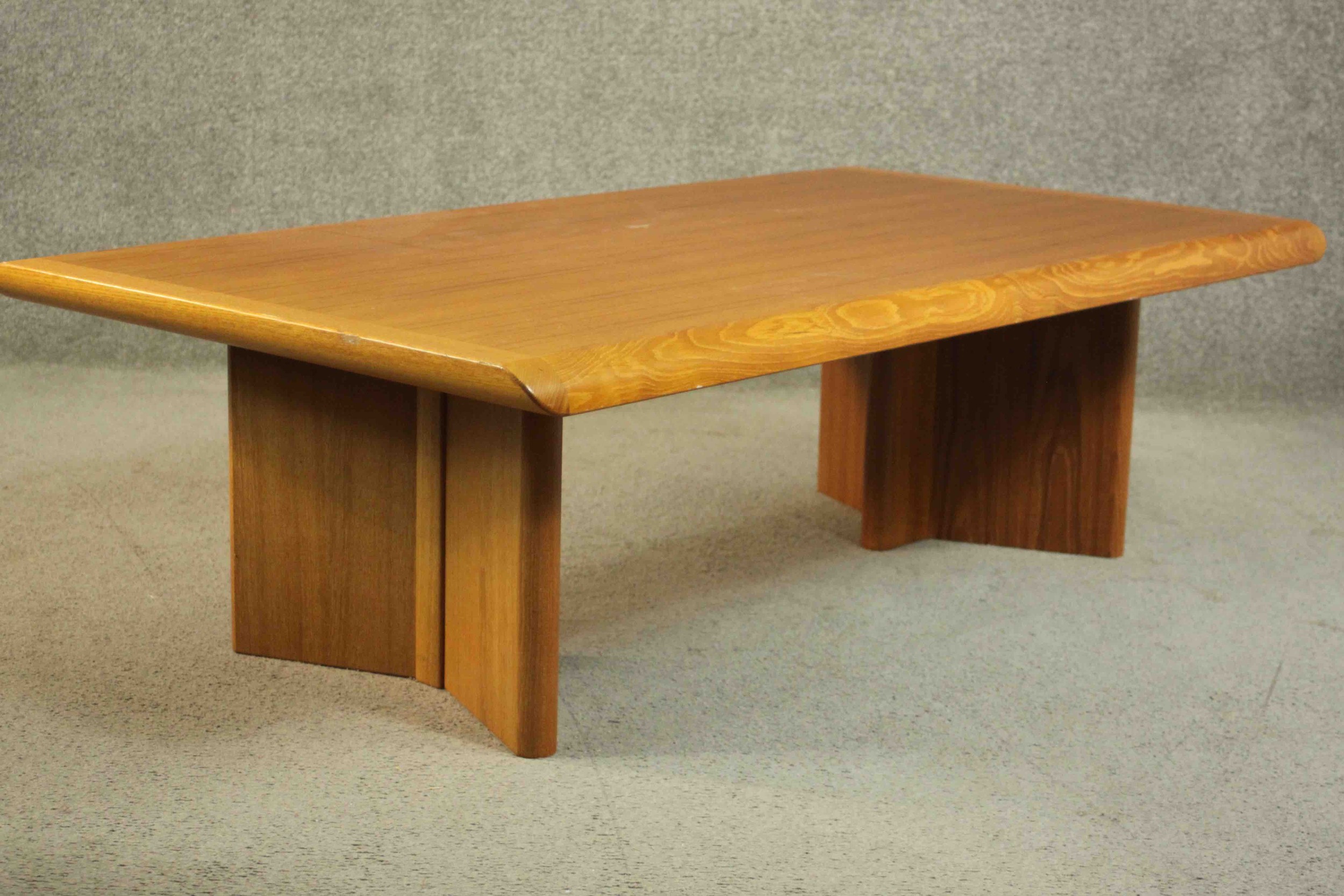 A 1970s vintage Danish teak coffee table on shaped block end supports. H.40 W.135 D.75cm. - Image 5 of 6