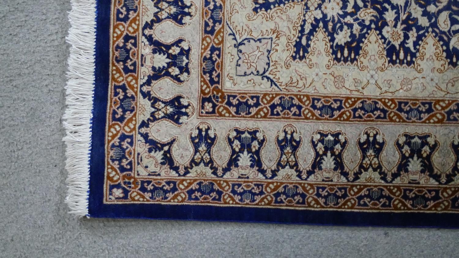 A handmade blue ground Chinese silk rug L.118 H.76cm - Image 6 of 6