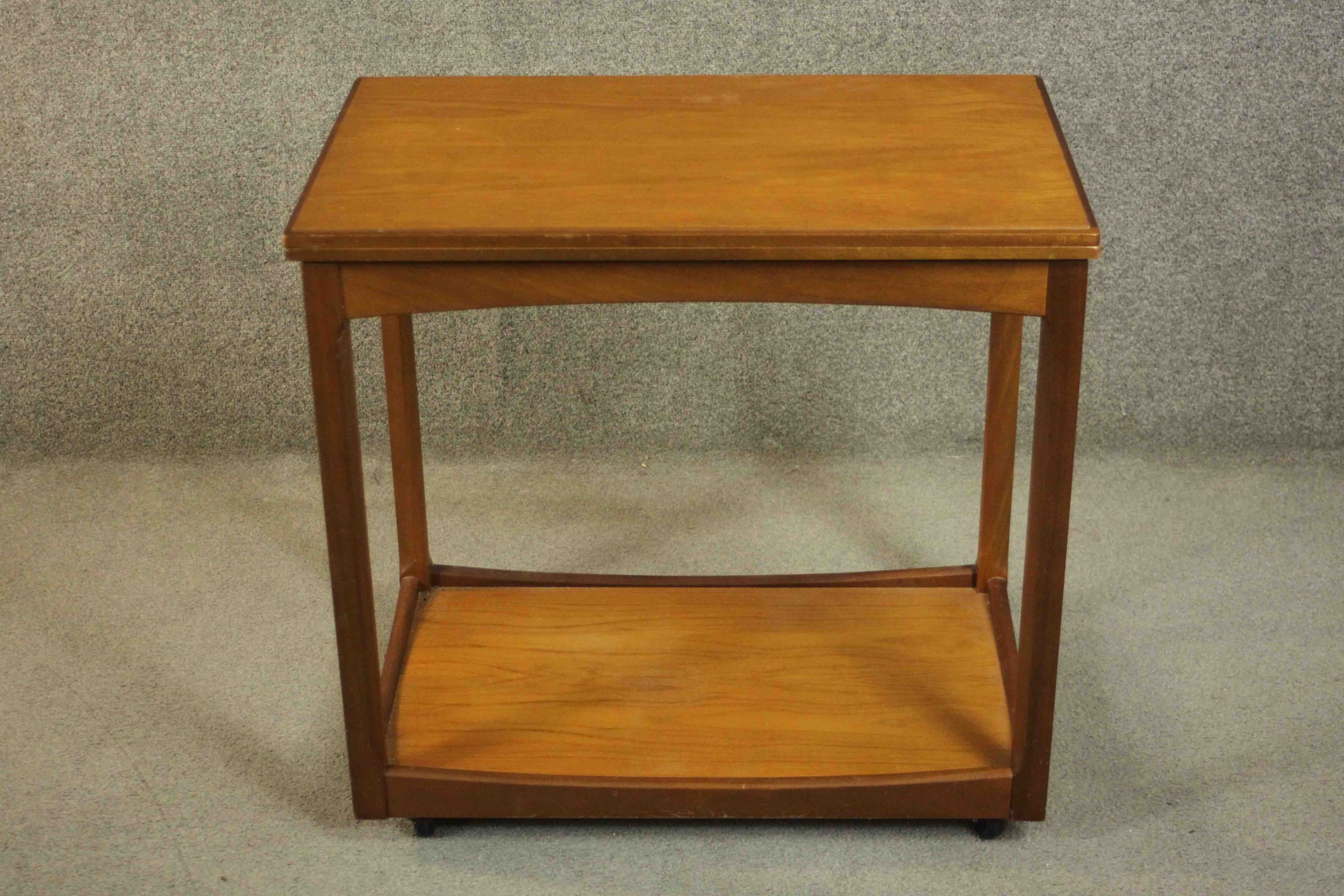 A circa 1960s teak trolley by Legate of Scotland of rectangular form with an undertier. H.68 W.71 - Image 2 of 16