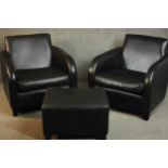 A pair of contemporary black leather armchairs, on tapering block feet, together with a matching