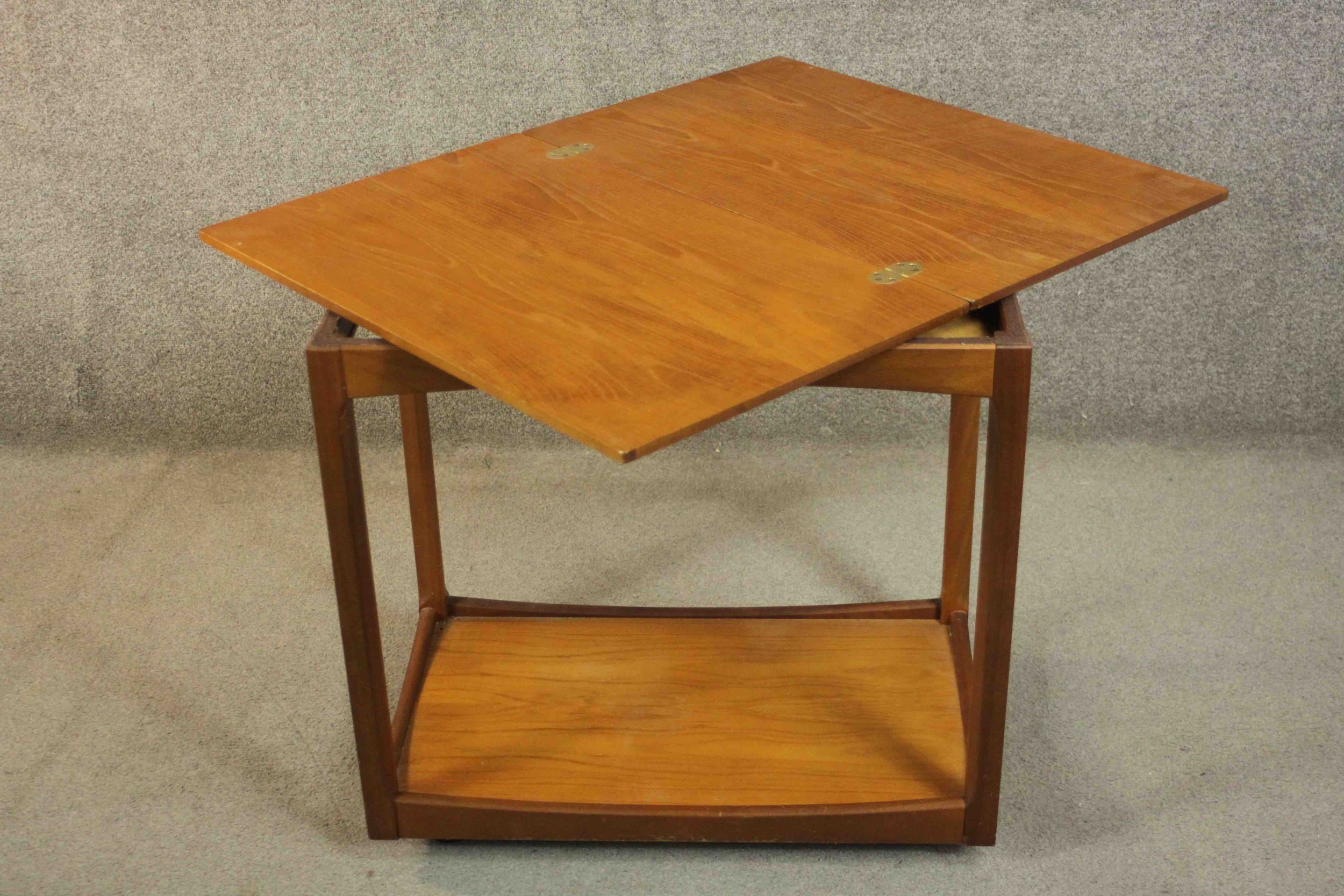 A circa 1960s teak trolley by Legate of Scotland of rectangular form with an undertier. H.68 W.71 - Image 7 of 16