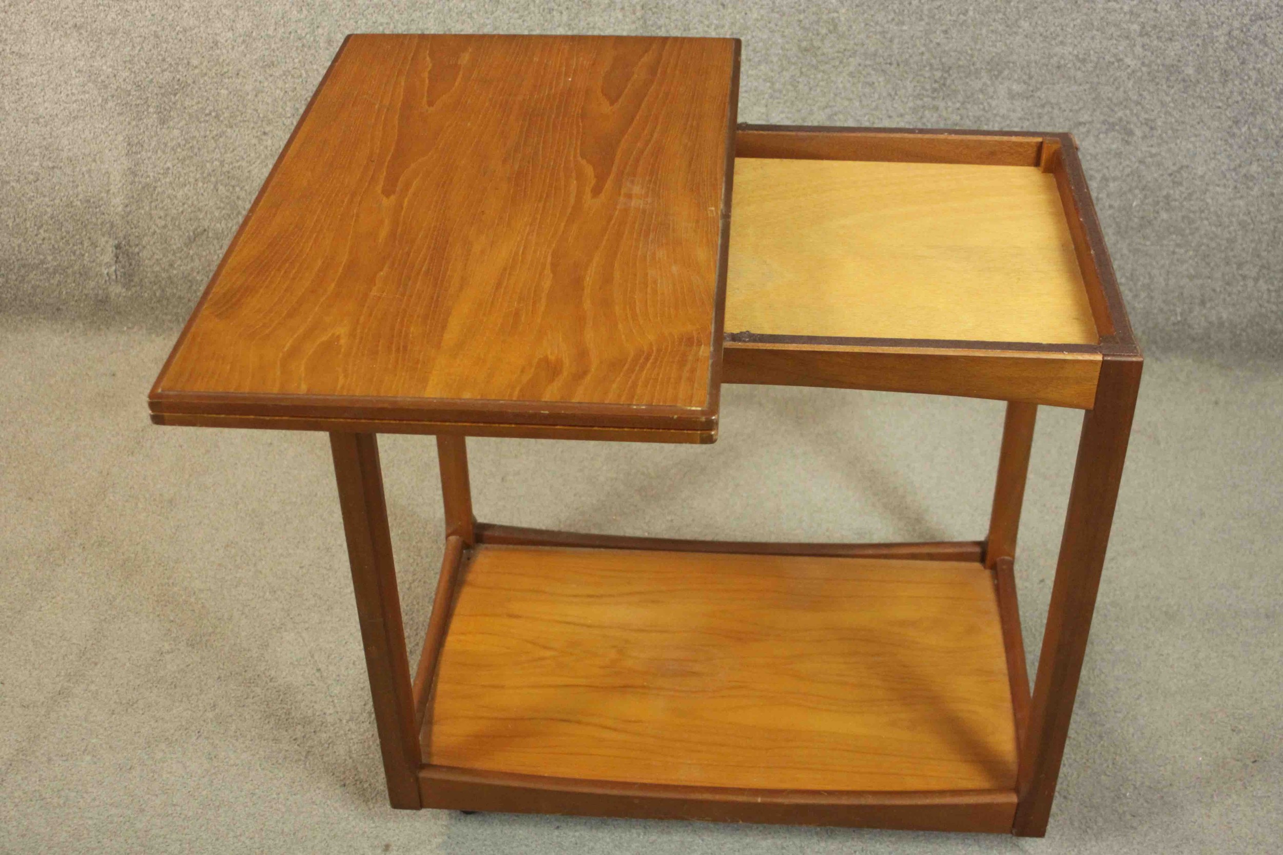 A circa 1960s teak trolley by Legate of Scotland of rectangular form with an undertier. H.68 W.71 - Image 11 of 16