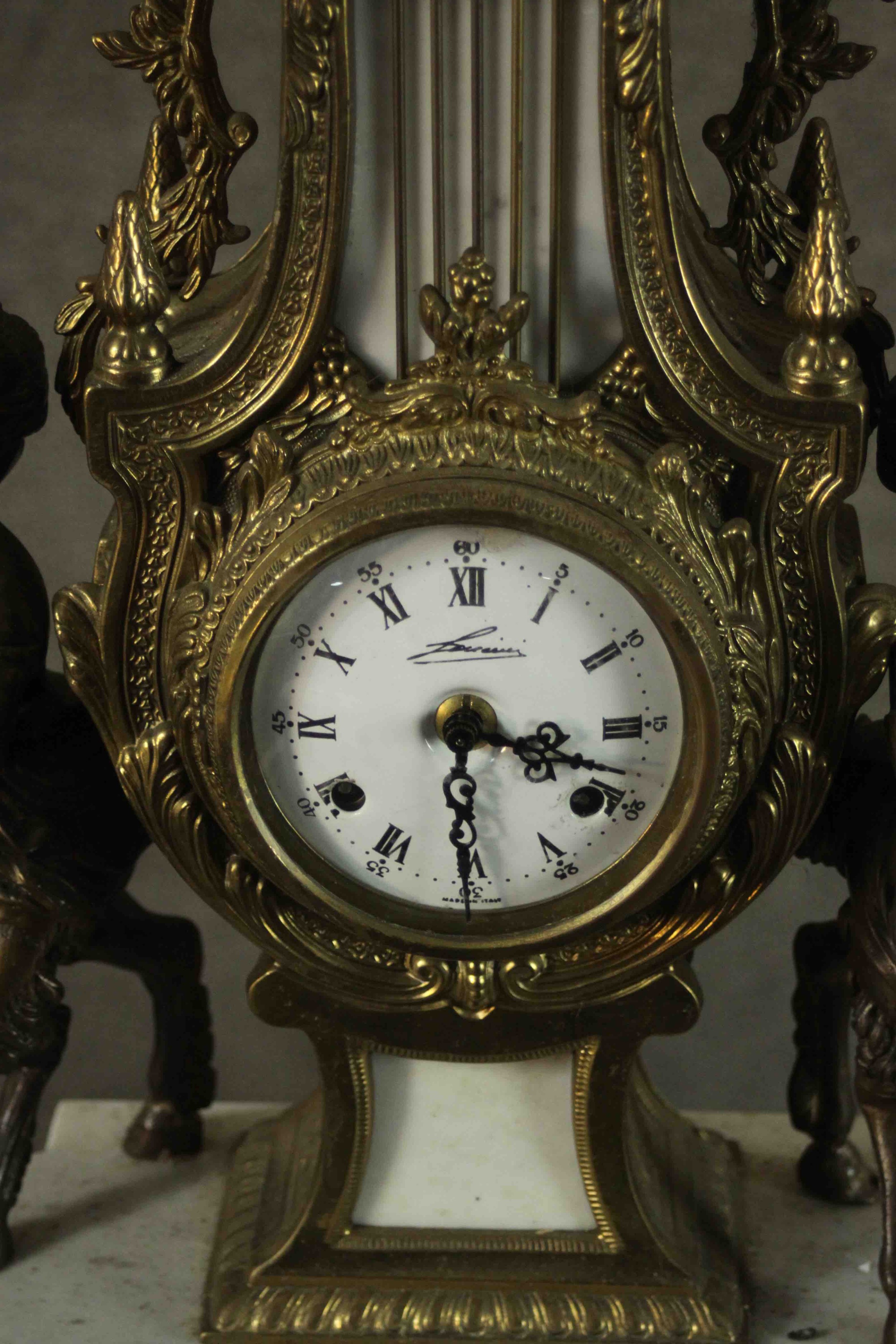 A 20th century Italian gilt metal clock garniture, the clock of lyre form with an enamelled dial - Image 4 of 15