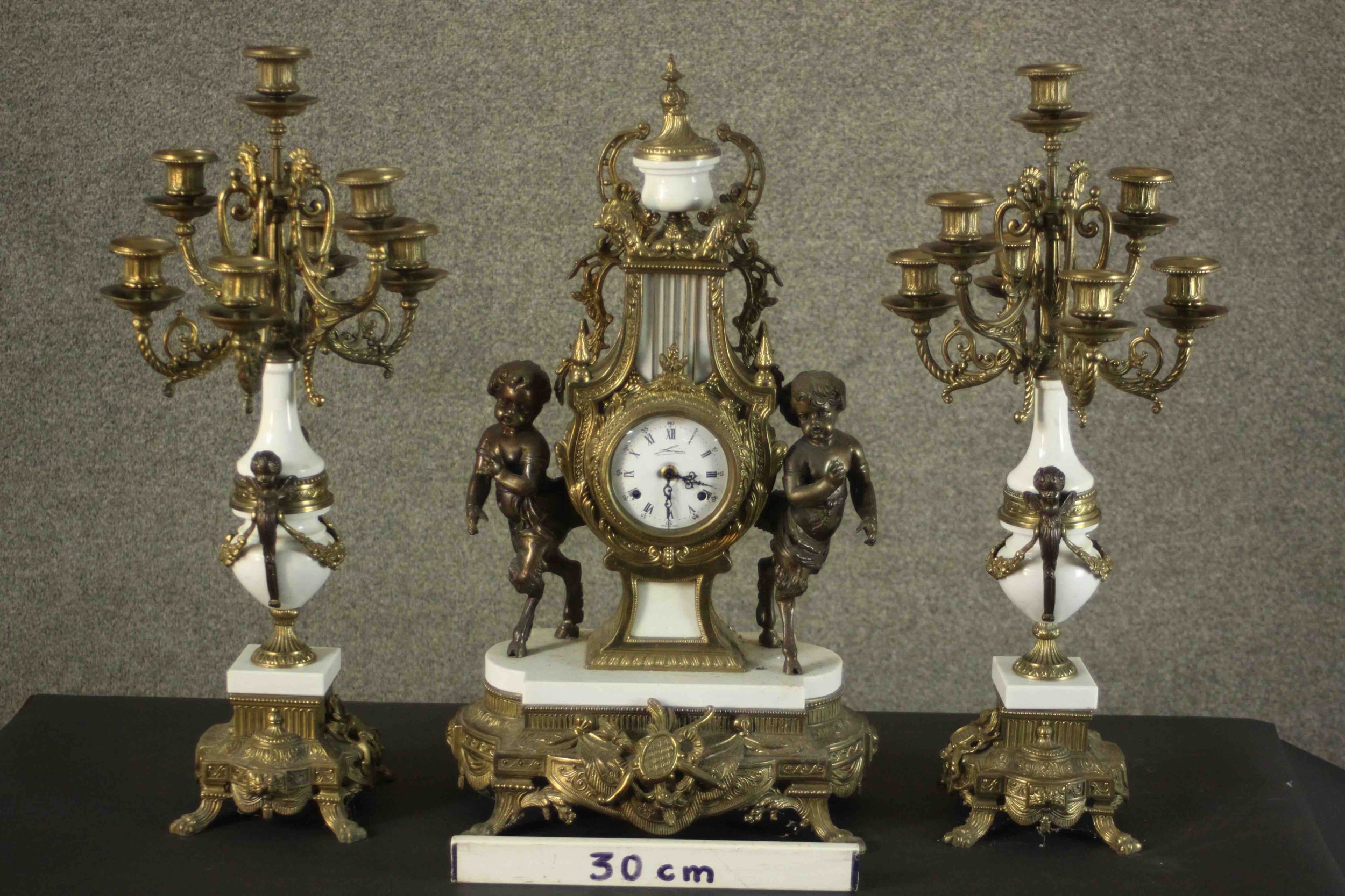 A 20th century Italian gilt metal clock garniture, the clock of lyre form with an enamelled dial - Image 2 of 15