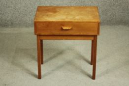 A circa 1960's probably Danish teak side table with a single drawer, on square section legs. H.46