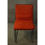 Gordon Russell for Verco, an office chair, upholstered in red fabric, with a leather frame, on