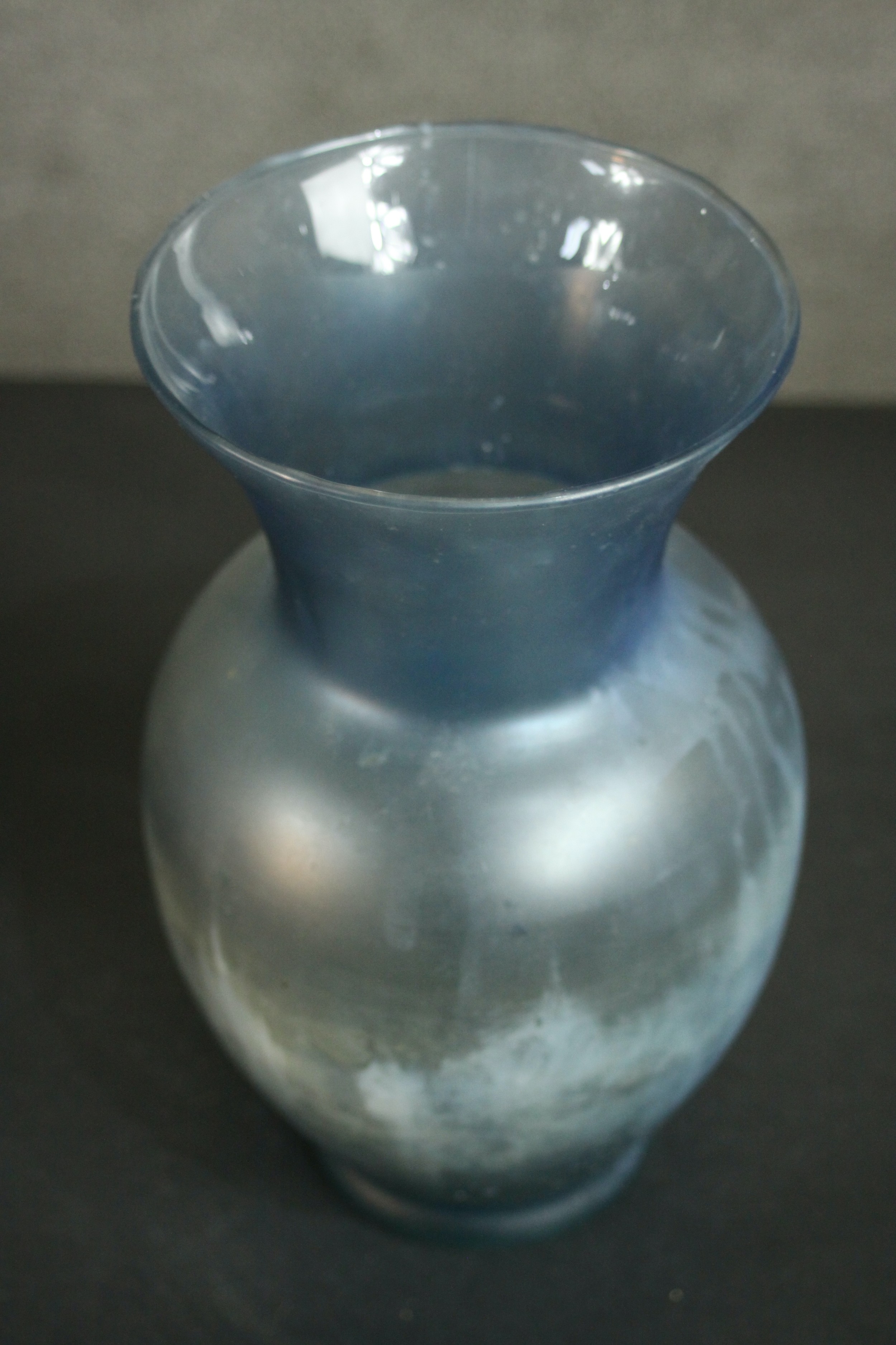 Two blue lustre art glass vases one with a trumpeting design. H.29 Dia.15cm. - Image 4 of 4