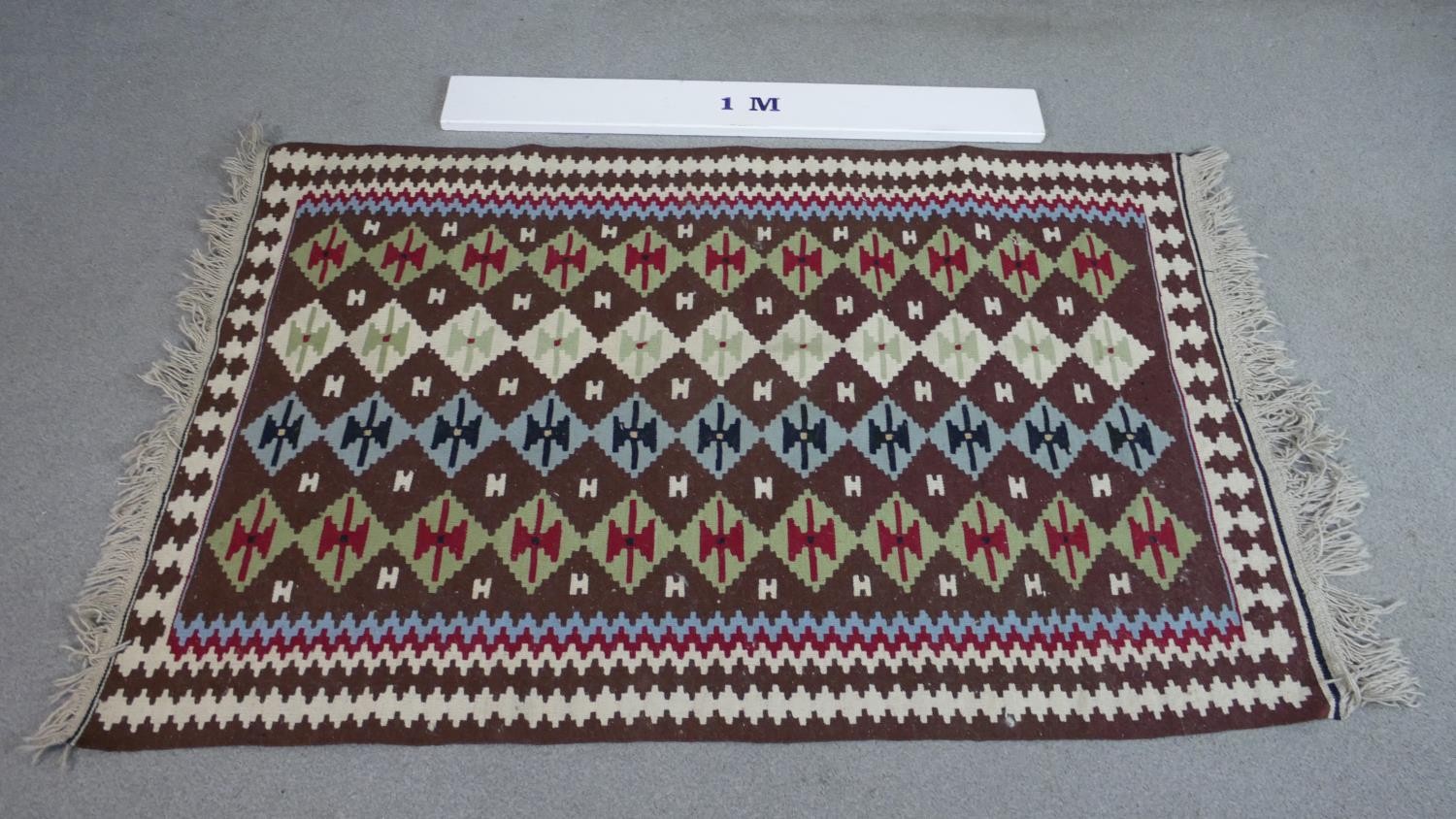 A handmade maroon ground Kelim rug with geometric design. L.147 D.101cm - Image 2 of 5