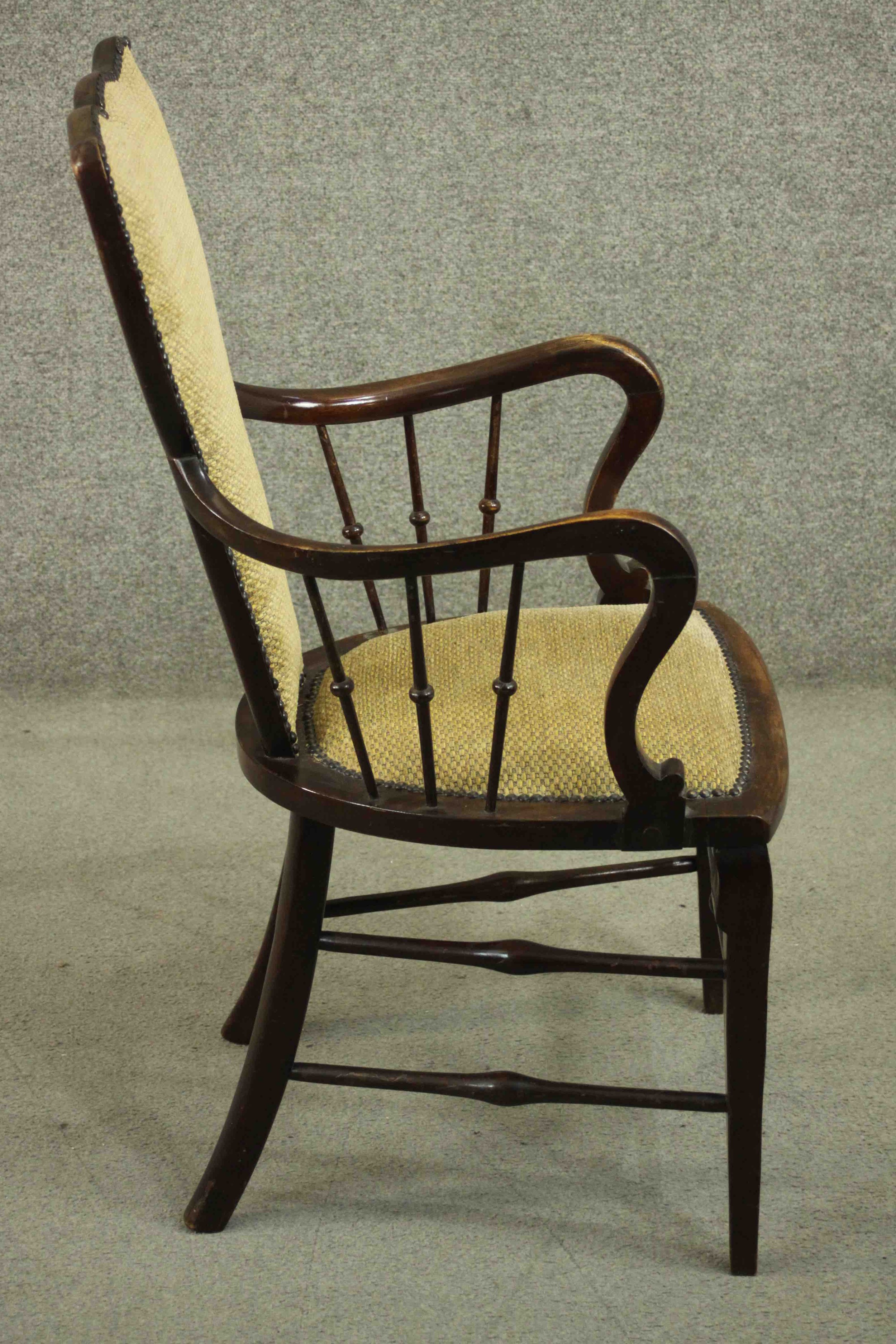 A circa 1900 open armchair, with a shaped back, and spindles to the curved arms, with yellow - Image 3 of 5