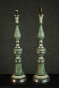 A pair of turned and painted tall green lamps, possibly Italian, with mottled green and cream