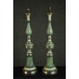 A pair of turned and painted tall green lamps, possibly Italian, with mottled green and cream
