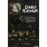 A framed and glazed signed Coldplay double platinum album, Viva la Vida. H.70 W.50cm.