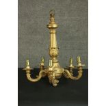 A Continental carved giltwood chandelier, late 19th century with a fluted and acanthus leaf carved