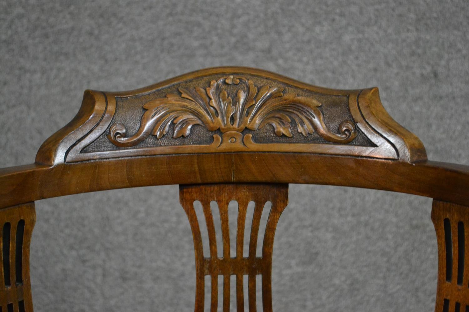 An Edwardian walnut corner chair with a carved back rail over pierced splats over a patterned seat - Image 3 of 5
