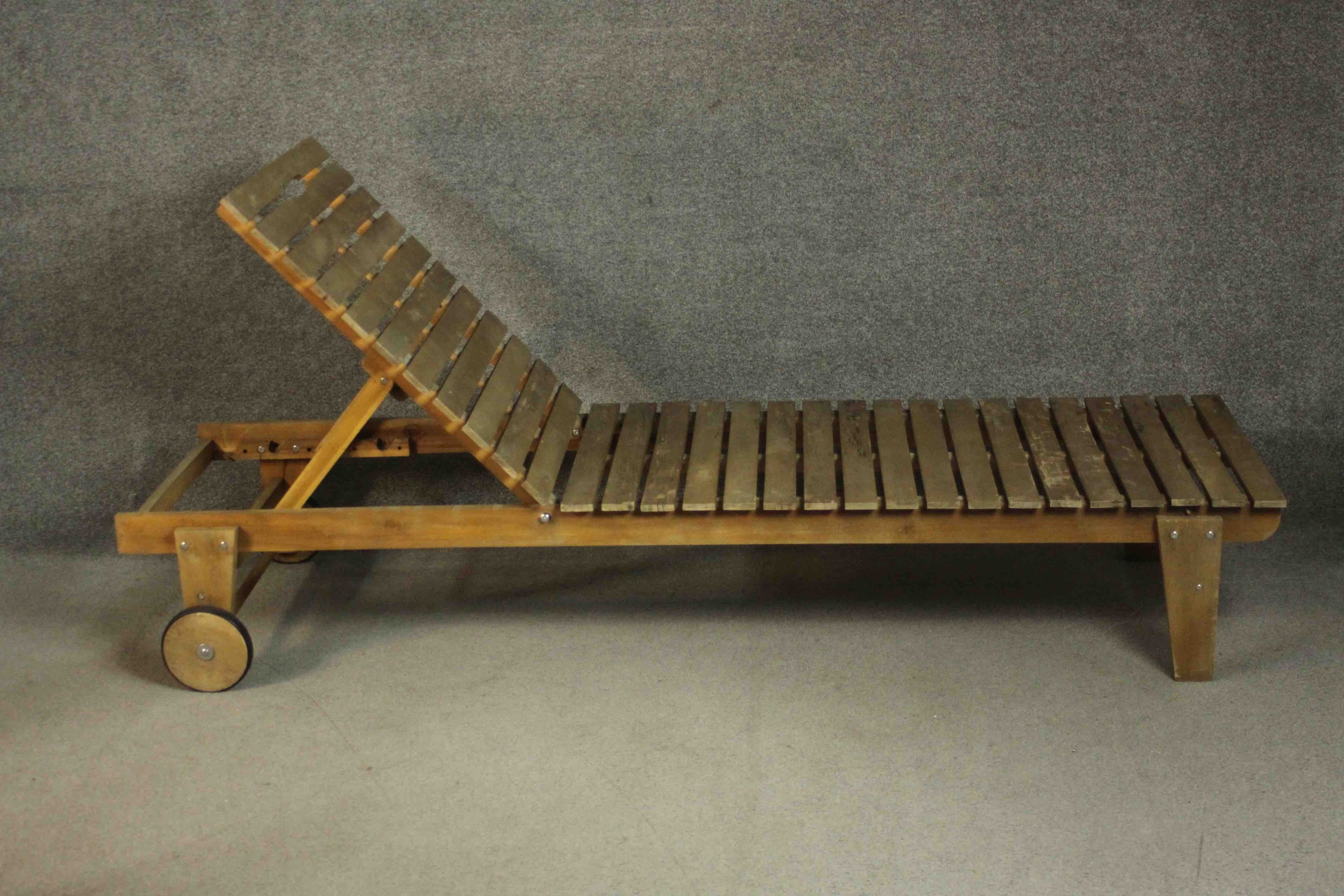 A pair of contemporary teak garden sun loungers of slatted form with adjustable back, on wheels. H. - Image 6 of 9