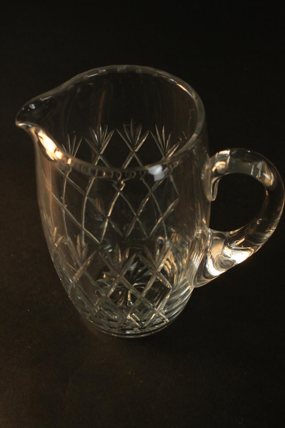 A collection of cut crystal and glass, including a large cut crystal lidded jar, various size jugs - Image 11 of 14