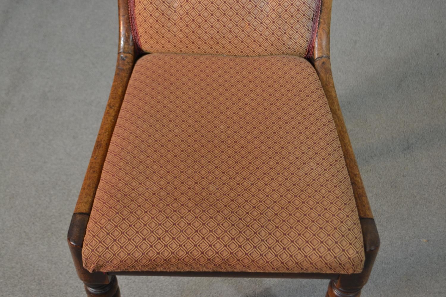 A George III mahogany side chair, with a buttoned back, upholstered in brown fabric, on turned legs. - Image 2 of 4